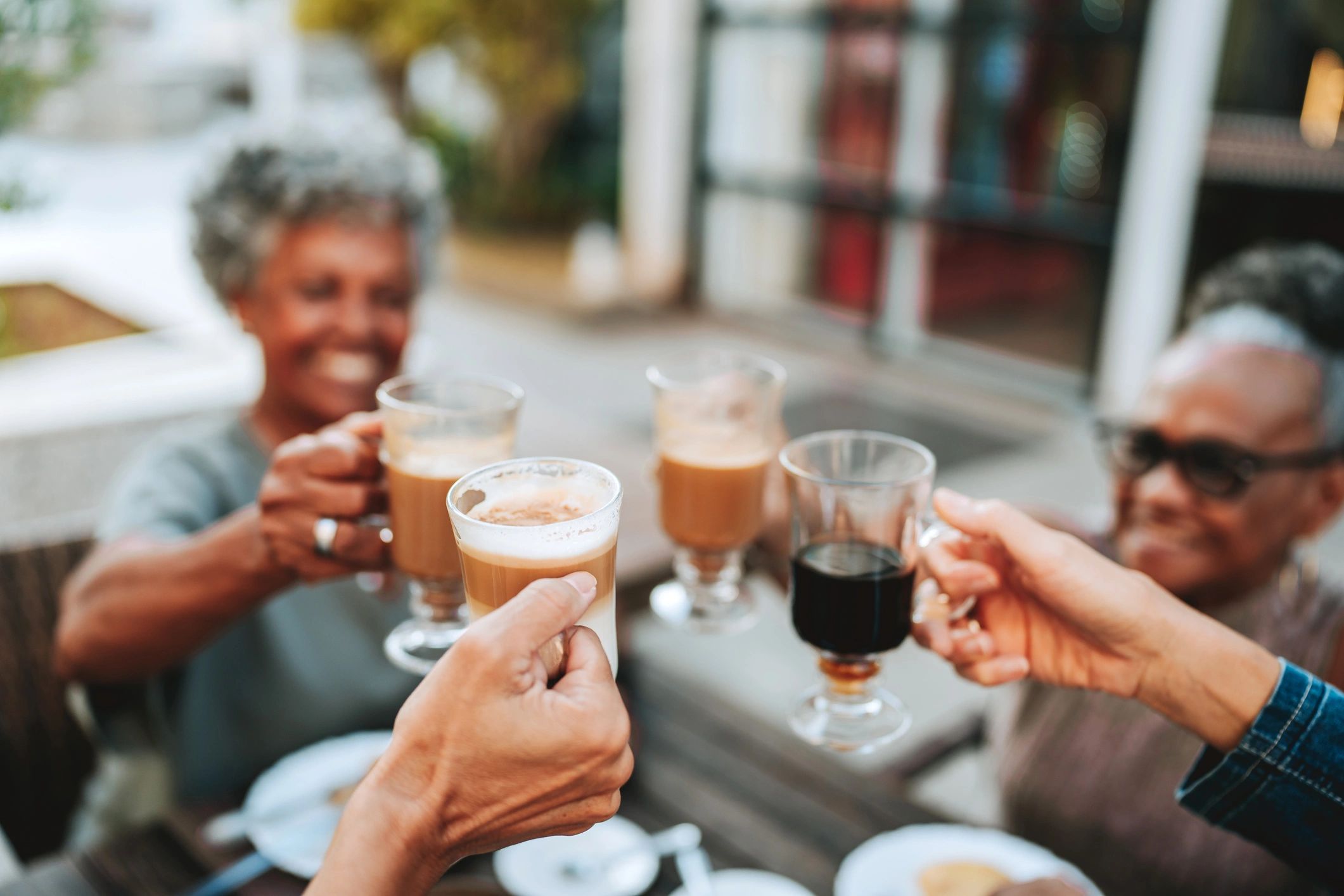Friends sharing coffee and conversation